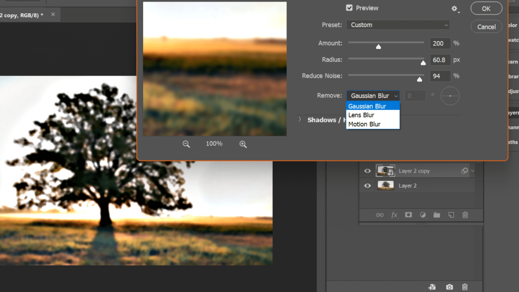Puede deshacerse del desenfoque de la imagen usando Gaussian, Motion y Lens Blur.